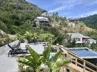Secluded Island Escape w/ King Bed, Lush Gardens & Shared Pool Access Hotels in Coral Bay