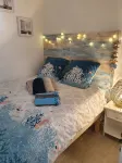 Quiet garden-level apartment with sea view - Ocean View