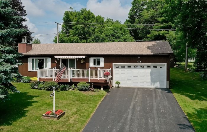 Cozy lake view home, centrally located with lake access and private dock!