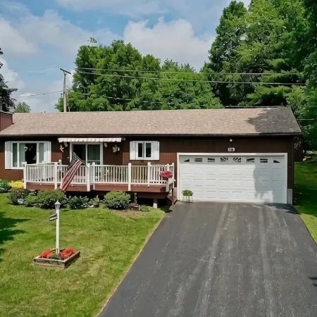 Cozy lake view home, centrally located with lake access and private dock!