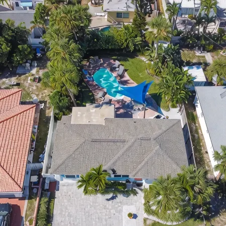 4-Bed Coastal Retreat: Heated Pool, 200 Steps to Beach, Walk to Fun!