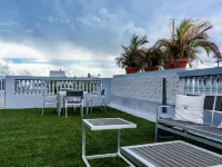 Navona Studios Hotels near Escambrón Beach