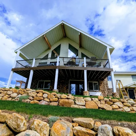 Golf Course Lakehouse with fantastic views of the lake, mountains & golf course.