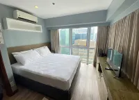"Cozy 2- bedroom with Netflix in the heart of BGC - Wi-Fi