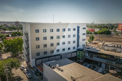 Homesuites Malecon Hotels near lomas del sol Josefina Chang Park