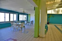 Dolphin Beach condo with indoor pool, ocean views, steps to the beach