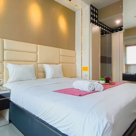 Best Combined Unit 2BR at Orchard Supermall Mansion Apartment By Travelio Hotels in Sambikerep