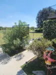 Charming cottage in Cypress with lake view ,WiFi, AC and relaxing outdoor patio.