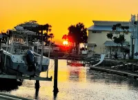 Unique waterfront home, Hot Tub, private boat dock,  walk to beach, pet friendly
