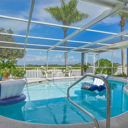 Oasis on the Gulf, screened pool, sunset, kayaks!