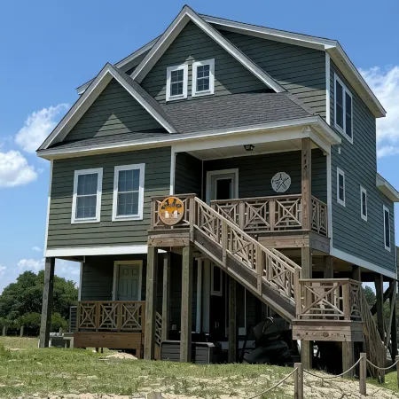 New in 2024 Carova Beach Canal Front Home!! 4X4 Required