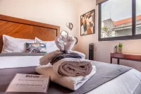 Deluxe Room in Condesa + Rooftop & Coworking - Epsilon by Nomadier - บังกะโล
