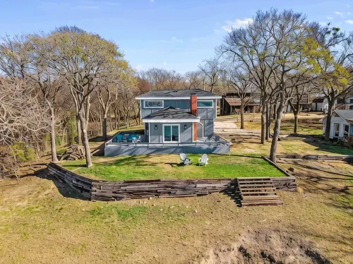 Rare Modern Beachfront Lake House on Lewisville Lake with Hot Tub, Deck & BEACH - 4-Star