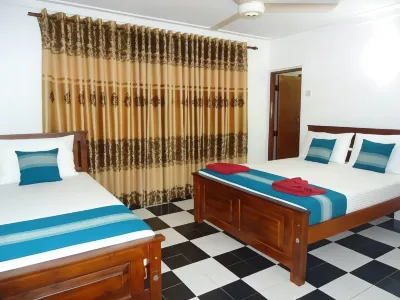 Rajarata White Palace Hotels near Bogashandiya - Bodhi Tree