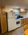 Cozy 2-bedroom cabin near endless trails. Family and pet friendly. Fire pit & AC