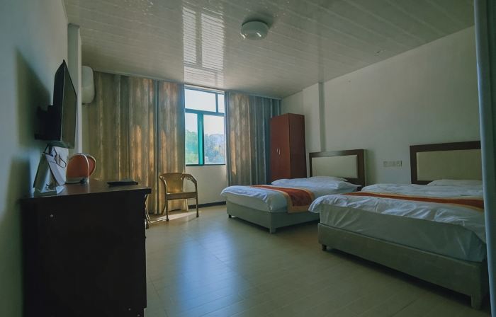 Yuexi Hualintu Restaurant Homestay
