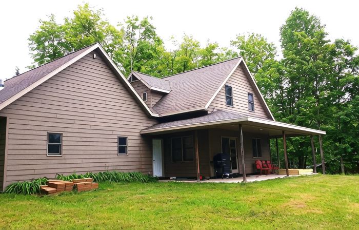 Beautiful newer home on the sunny side of peaceful Camp Lake in Iron River