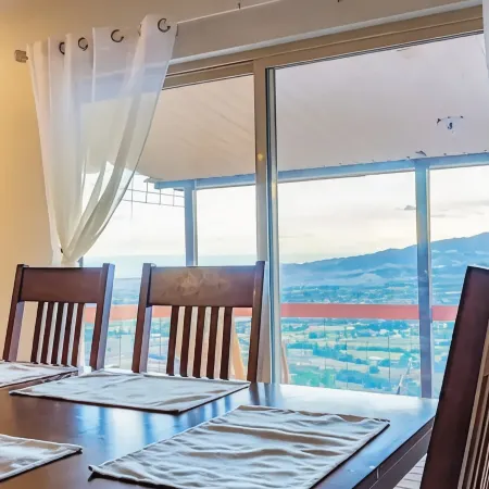 Home on the mesa’s edge the Proverbial Million Dollar View, jacuzzi and orchard