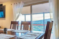Home on the mesa’s edge the Proverbial Million Dollar View, jacuzzi and orchard