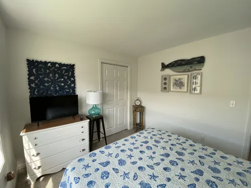 One mile to the beach!  2 br condo with deck, A/C, full kitchen, washer, dryer - Gym