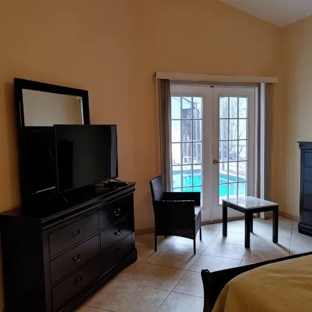 Beachside Pool House with heated pool, Short Walk to the Beach!
