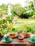 Motu Beachfront Art Villas - Bãi đậu xe