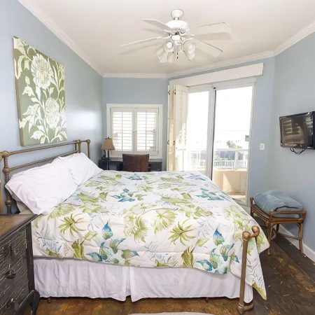 Luxurious 2nd floor beachfront condo w wrap-around balcony @ The Enclave
