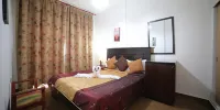 Green Furnished Apartments - 家庭套房房间