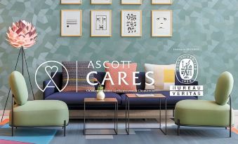 "a modern living room with a couch , chairs , and framed art on the wall , accompanied by the text "" ascott cares "" and """ at Somerset Harbourview Sri Racha
