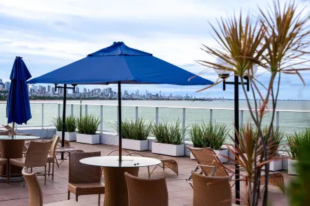 Flat Beira-Mar Blue Sunset