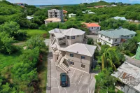 Your quaint home just steps from beach