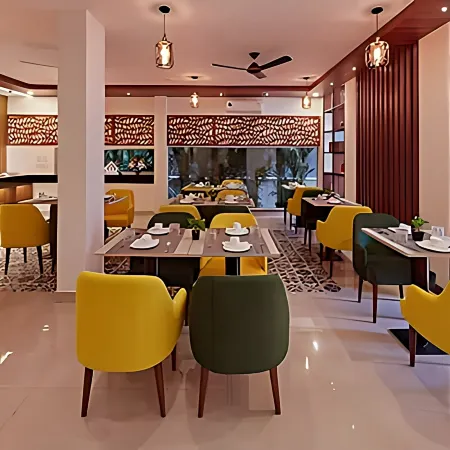 Regenta Inn Indiranagar by Royal Orchid Hotels Отели рядом с достопримечательностью «Бизнес-комплекс RMZ Infinity»