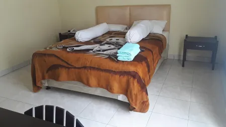 Melur 15 Homestay Отели в г. Selaparang