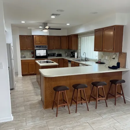beautiful home on a 3 acre lake with security