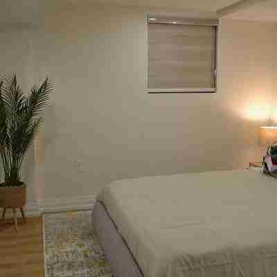 Modern 2-Bed Basement Retreat! Rooms