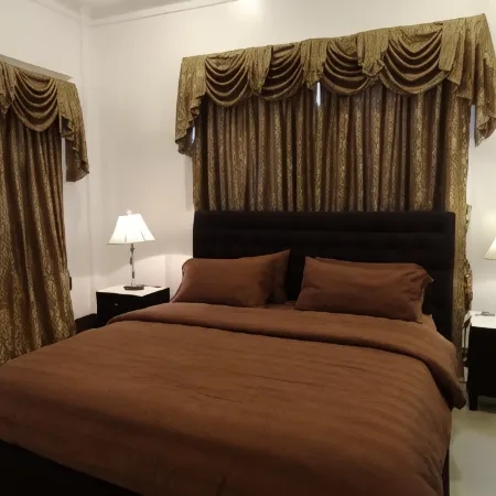 The Executive Villa Inn & Suites