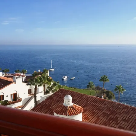 MAGNIFICENT OCEAN VIEW Hamilton Cove Condo With Golf Cart Included.