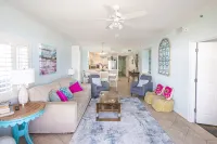 Luxurious 2nd floor beachfront condo w wrap-around balcony @ The Enclave - 2-Star