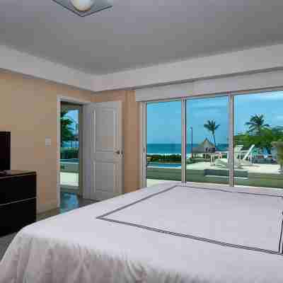 Walk to Eagle Beach – Exclusive 6Br Beachfront Condo with Private Pool & Jacuzzi Rooms