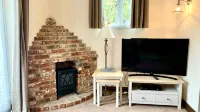 A beautiful, cosy cottage in a peaceful setting with 15% off ferry - 4-Star