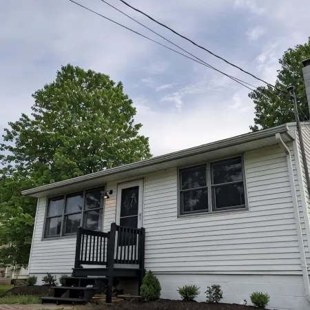 Beautiful home with 150ft sandy beach and private boat launch on Big Sebago!!!!!