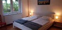 Holiday house with a large garden and swimming lake in the village - Hot Tub