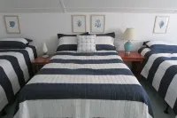 Just steps to the beach, bar, and playground park! - 2-Star