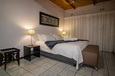 Protea Park Self Catering Guesthouse Hotels near Geelhout Gardens Playground