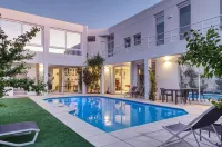 Peach on Beach Boutique Guesthouse Hotels in Bloubergstrand