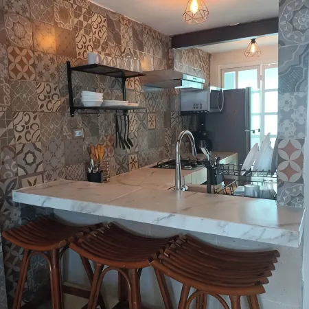 Linda casa con alberca y cascada.