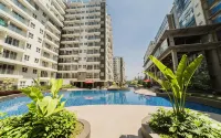 Minimalist 1Br at Gateway Pasteur Apartment by Travelio - Bungalows