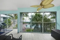 Stunning beachfront condo next to restaurant & a short drive to famous RumPoint