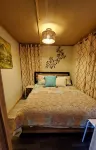 Cozy tiny cabin nested in the trees in a lake community, peaceful countryside.