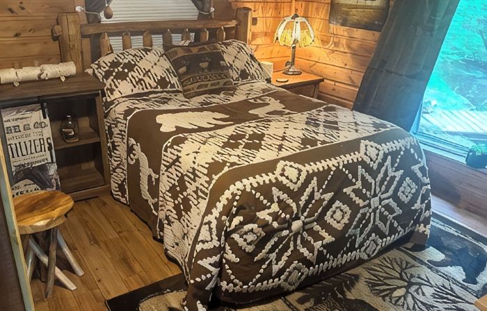 A Stream  runs through it. Comfy little cabin with a stream by your bedroom.